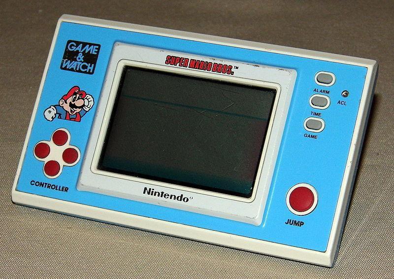 Orologio da gioco Super Mario Bros. di Nintendo, modello YM 105, prodotto in Giappone, copyright 1988, gioco elettronico portatile.